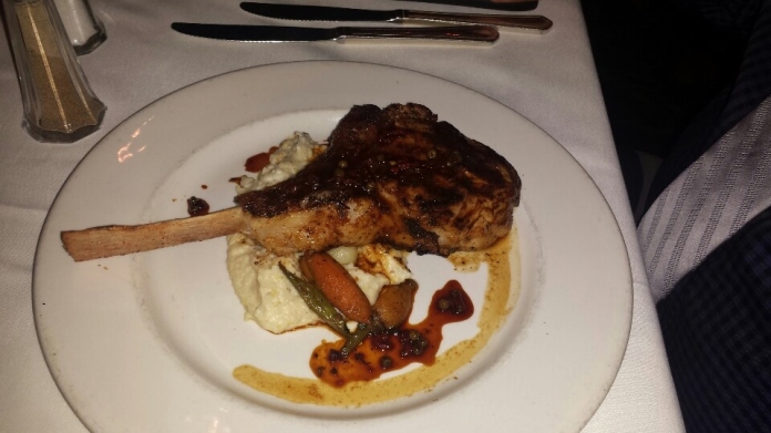 Veal Chop Tchoupitoulas and amazing grits